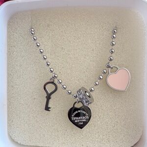Tiffany faux pink heart key necklace.